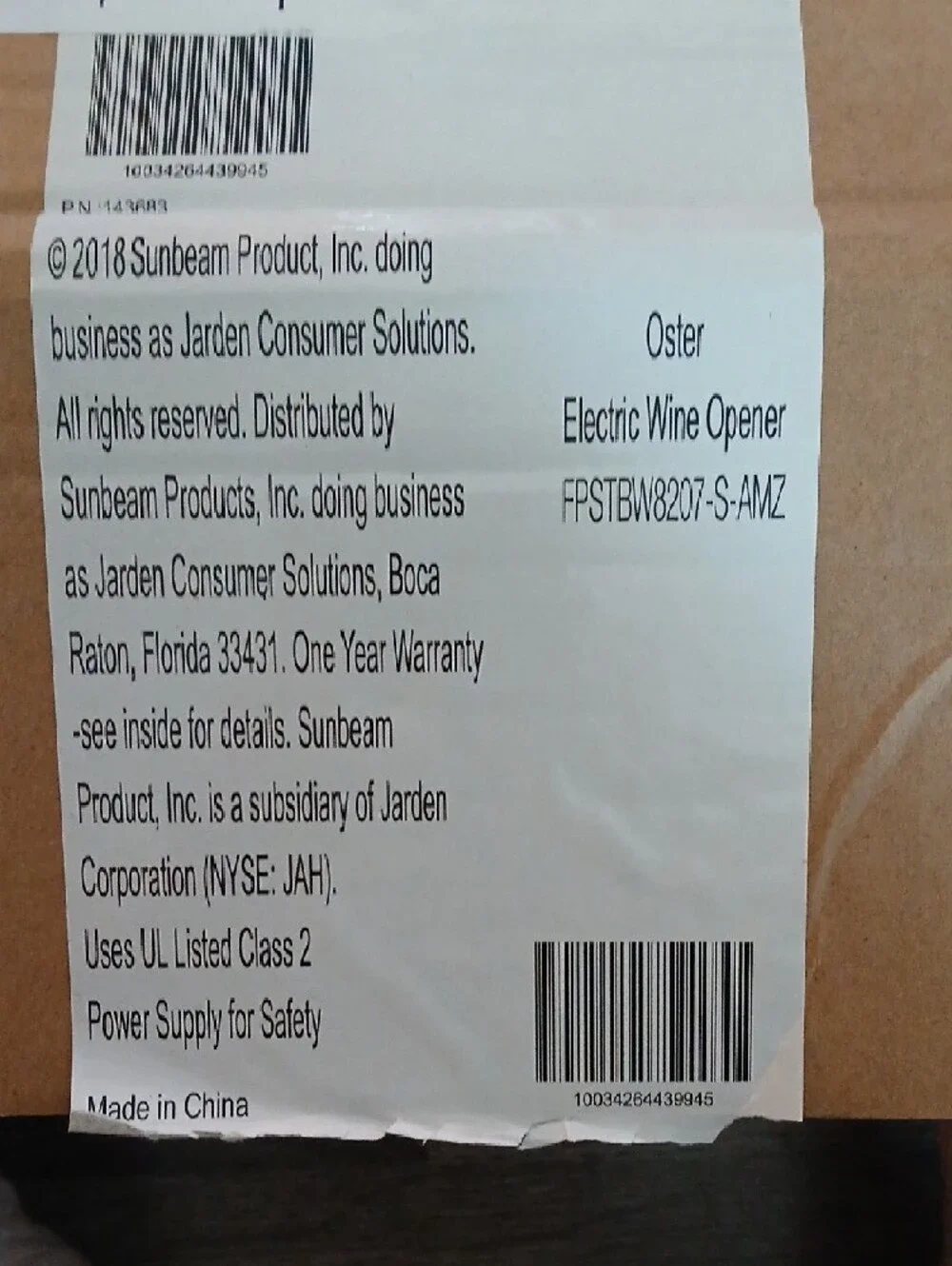Oster Electric Wine Opener Box Label with Brown and White Tones